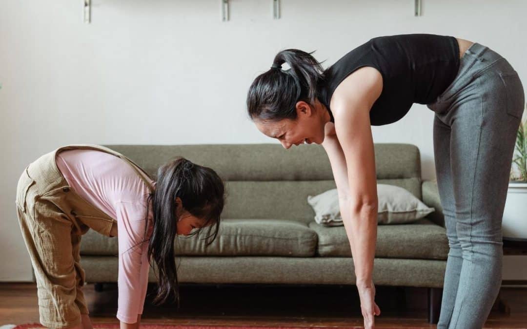 A Mother and Daughter Doing Exercise | MUM CFOS