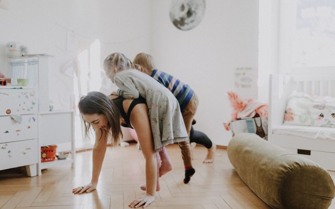 DediKate Postpartum and Pregnancy Coach, Jess Baker and her kids exercising